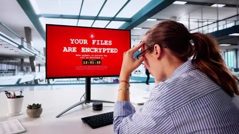 Computerscherm met een rode waarschuwing dat bestanden zijn versleuteld door ransomware