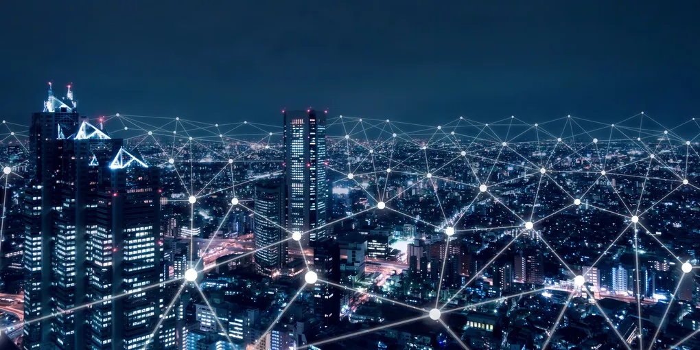 Verlichte stad met een netwerk van verbindingen, symbool voor zakelijk internet en glasvezel in Dordrecht